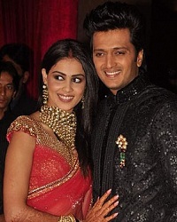 Riteish has a Sherwani and Genelia is a wearing a saree for their Wedding Reception
