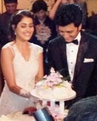 Ritish & Genelia cut their wedding cake after their Catholic church wedding on Feb 4