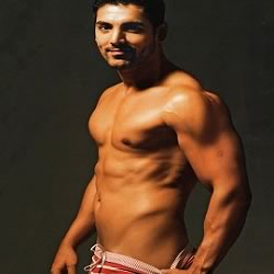 Photo of John Abraham in shorts and bulging muscles