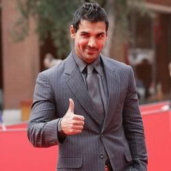 Photo of smart John Abraham in a suit