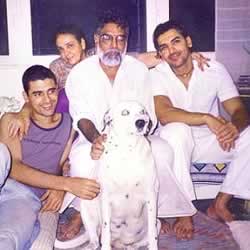 John Abraham, his Brother, Mother, Father and family dog. This is an old picture of the Abraham family