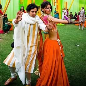 Kunal Nayyar (Raj Kootrapalli) dancing with wife Neha Kapoor at their Indian Marriage