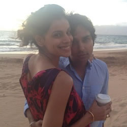 Miss India, Neha Kapur, with husband, Kunal Nayar (Big bang) on the beach.