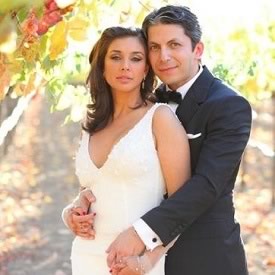 Wedding picture of Lisa Ray and husband Jason Dehni. Lisa is wearing a Wendell Rodricks gown.