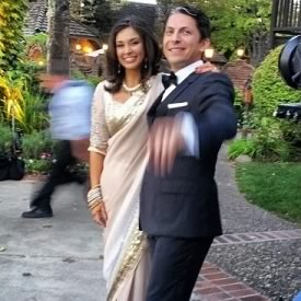 Marriage Picture of Lisa Ray and husband Jason Dehni. Lisa wore a Satya Paul Indian Wedding Saree.