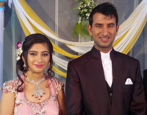 Photo of batsman Pujara and his wife at their Wedding Reception.