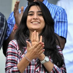 Cheteshwar Pujara's Wife, Pooja cheering him at the stadium.