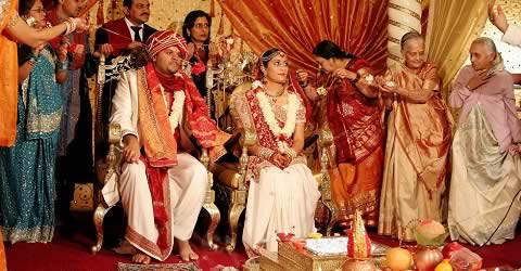 Hasta Melap is a Gujarati Wedding ceremony where the bride and groom are tied together.