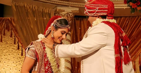 In the "Jaimala" or "Varmala" Hindu wedding ceremony, bride and groom exchange garlands