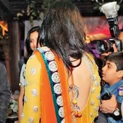 Aesha Mukherji has tattoos, like her husband Shikhar Dhawan.