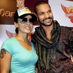 Shikhar Dhawan with wife Aesha, who has an "Om" tattoo.