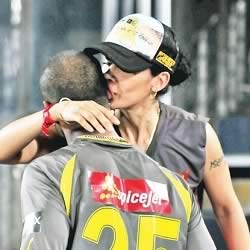Shikhar Dhavan's wife Aesha kiss him during IPL 2013. Shikher plays for SRH (Sun Risers Hyderabad).