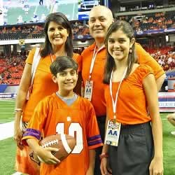 South Carolina Governor and Clemson Alumini, Nikki Haley, with husband, Michael, and kids Nalin and Rena.