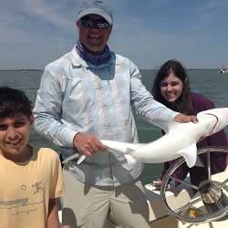 Nikki Haley's husband, Michael Haley, fishing with his son, Nalin and daughter, Rena.