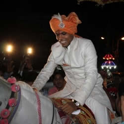 Bowler Umesh Yadav arriving at his wedding on a horse and with his Baraat.