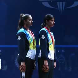 Dipika Pallikal and Joshna Chinappa on the podium on winning Gold.