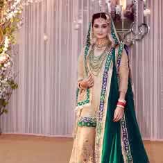 Dia Mirza in her wedding dress designed by Ritu Kumar