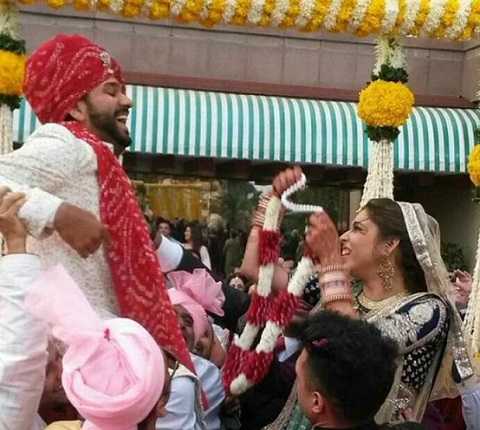 Rohit Sharma and wife doing Jaimala at their Marriage